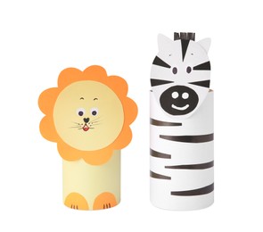 Photo of Toy lion and zebra made from toilet paper hubs on white background. Children's handmade ideas