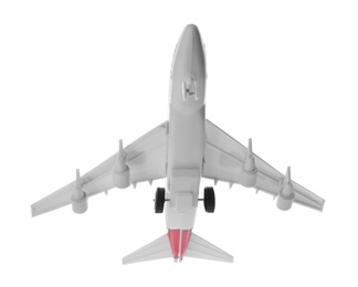 Toy airplane isolated on white. Travel concept