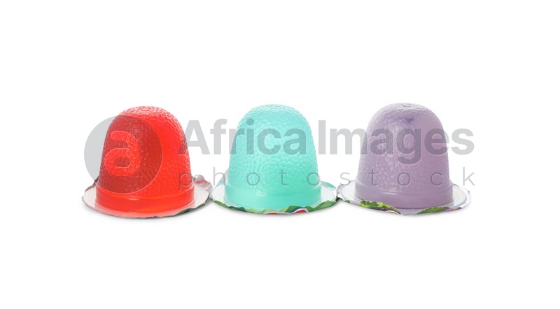 Tasty bright jelly cups on white background
