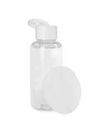 Bottle of micellar cleansing water and cotton pad isolated on white