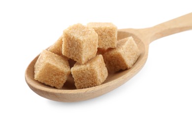 Brown sugar cubes in wooden spoon isolated on white, closeup