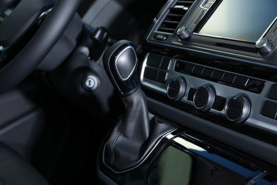 Gearshift and dashboard inside of modern car