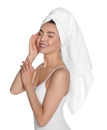 Photo of Beautiful young woman with towel on head against white background