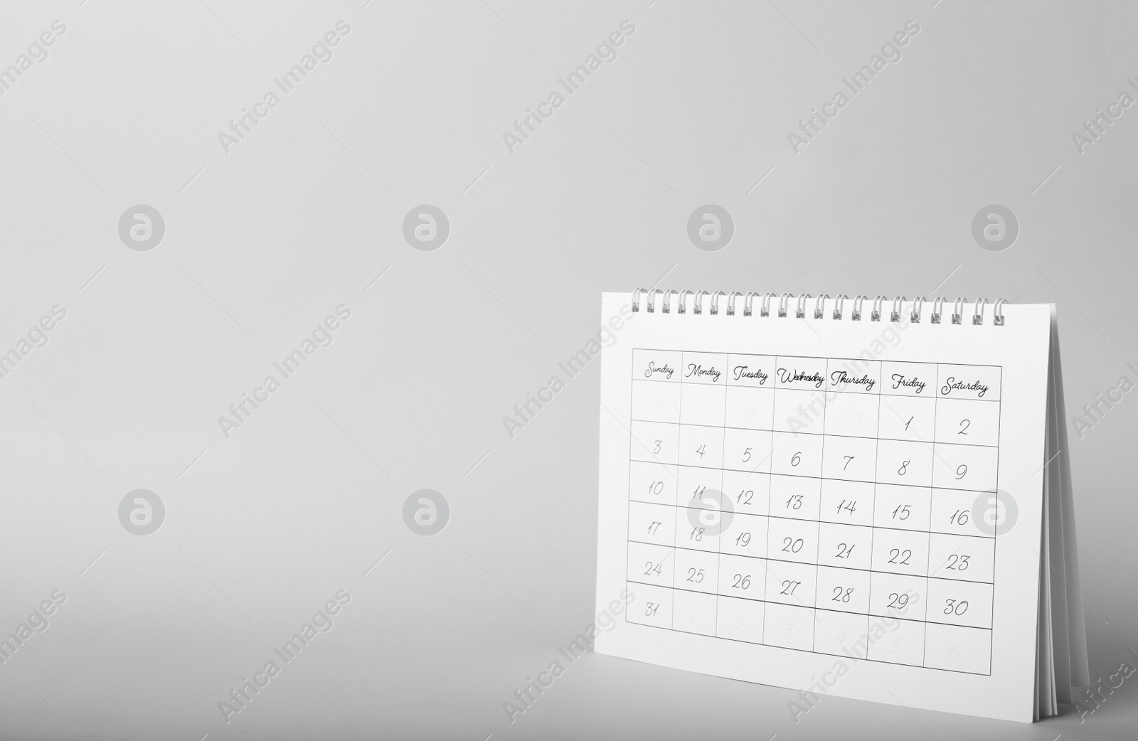 paper-calendar-on-grey-background-space-for-text-planning-concept