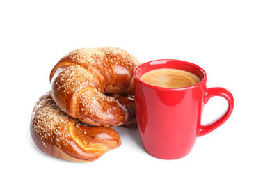 Delicious pastries and coffee on white background