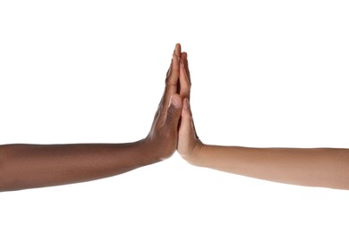 Woman and African American man giving high five on white background, closeup