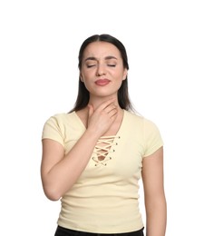 Young woman suffering from sore throat on white background. Cold symptoms