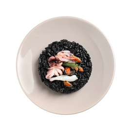 Photo of Delicious black risotto with seafood isolated on white, top view