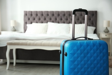 Travelling bag in hotel room