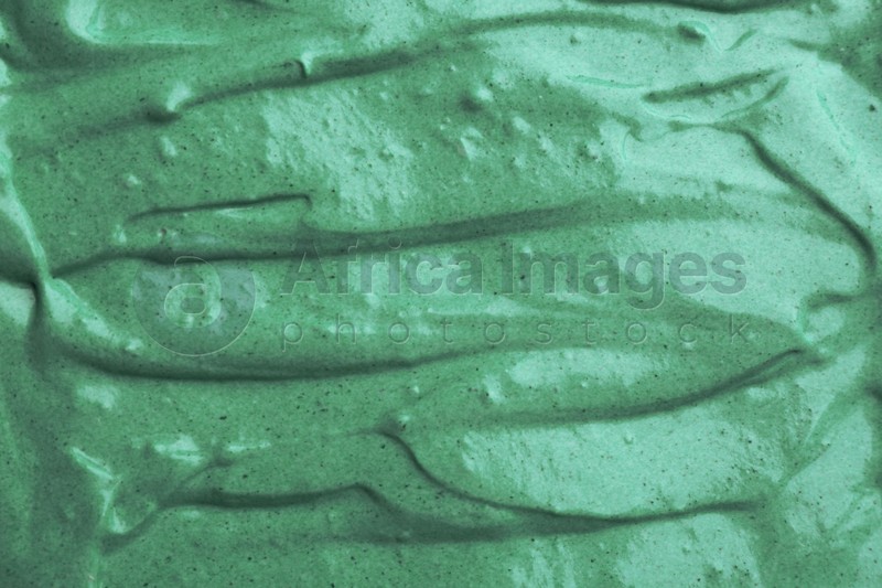 Photo of Natural spirulina facial mask as background, closeup