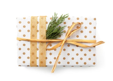 Christmas gift box decorated with fir branch isolated on white, top view