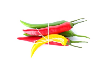 Ripe hot chili peppers on white background