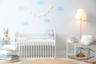 Blurred view of stylish baby room interior