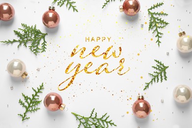 Image of Happy New Year! Flat lay composition with baubles and green branches on white background