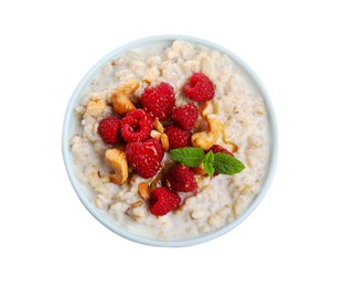 Photo of Bowl with tasty oatmeal porridge on white background, top view. Healthy meal