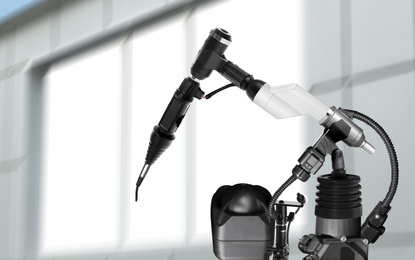 Modern electronic laboratory robot manipulator indoors, closeup. Machine learning