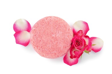 Solid shampoo bar and roses on white background, top view. Hair care