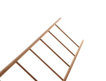 Photo of Modern wooden ladder isolated on white, low angle view