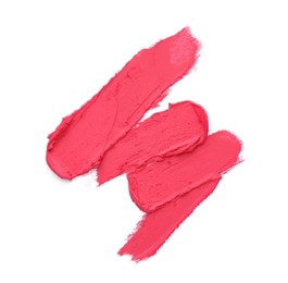 Smears of bright pink lipstick on white background