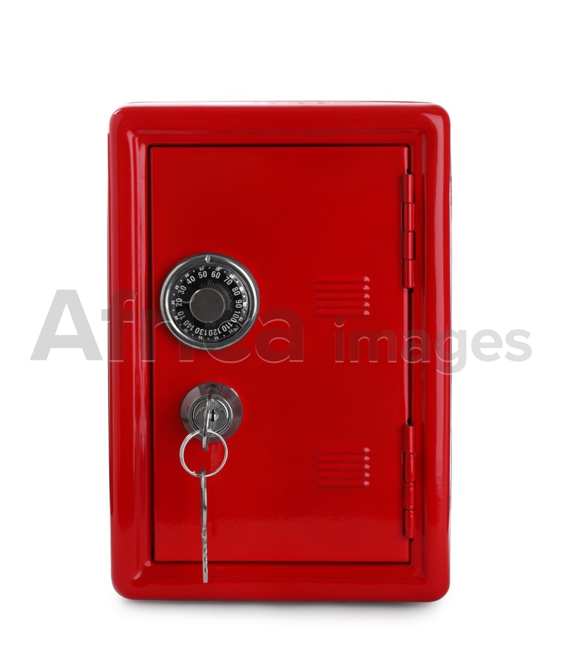 Red steel safe with keys isolated on white