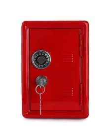 Red steel safe with keys isolated on white