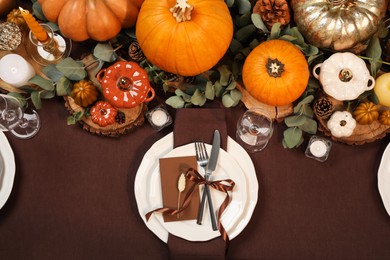Beautiful autumn place setting and decor on table, flat lay