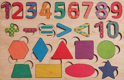 Photo of Wooden math game kit for children as background, top view
