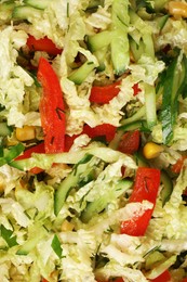 Delicious salad with Chinese cabbage, cucumber and bell pepper as background, top view