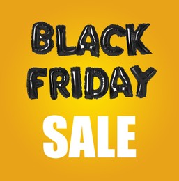  Phrase BLACK FRIDAY made of foil balloon letters on yellow background