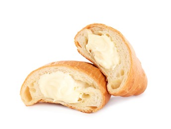 Photo of Halves of delicious croissant with cream on white background