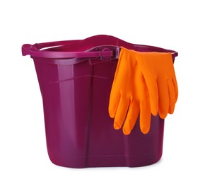 Photo of Purple bucket with gloves isolated on white
