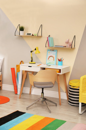 Stylish child room interior with modern furniture