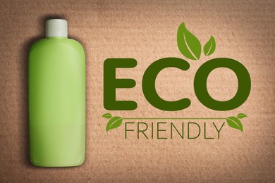 Organic eco friendly cosmetic product on cardboard background, top view