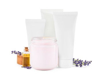 Different hand care cosmetic products and lavender on white background