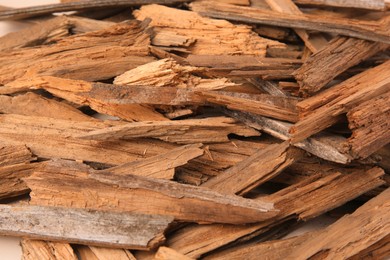 Photo of Many wood chips as background, closeup view