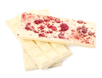 Photo of Chocolate bars with freeze dried raspberries on white background