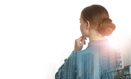 Image of Double exposure of businesswoman and city landscape