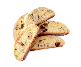 Photo of Slices of tasty cantucci with berry and pistachio on white background, top view. Traditional Italian almond biscuits