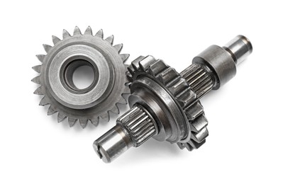 Photo of Stainless steel gears on white background, top view