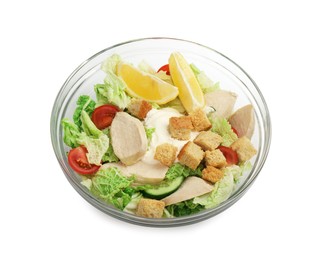 Bowl of delicious salad with Chinese cabbage, meat and bread croutons isolated on white