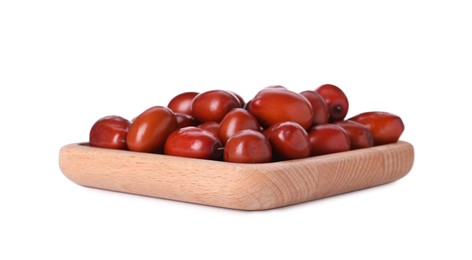 Wooden plate of ripe red dates on white background