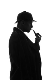 Old fashioned detective with smoking pipe on white background