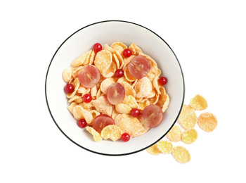 Corn flakes with berries on white background, top view. Healthy breakfast
