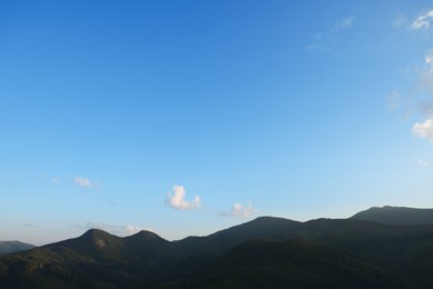 Photo of Beautiful view of blue sky over mountains on sunny day