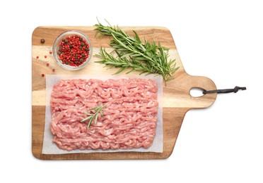 Raw chicken minced meat with spices and rosemary on white background, top view