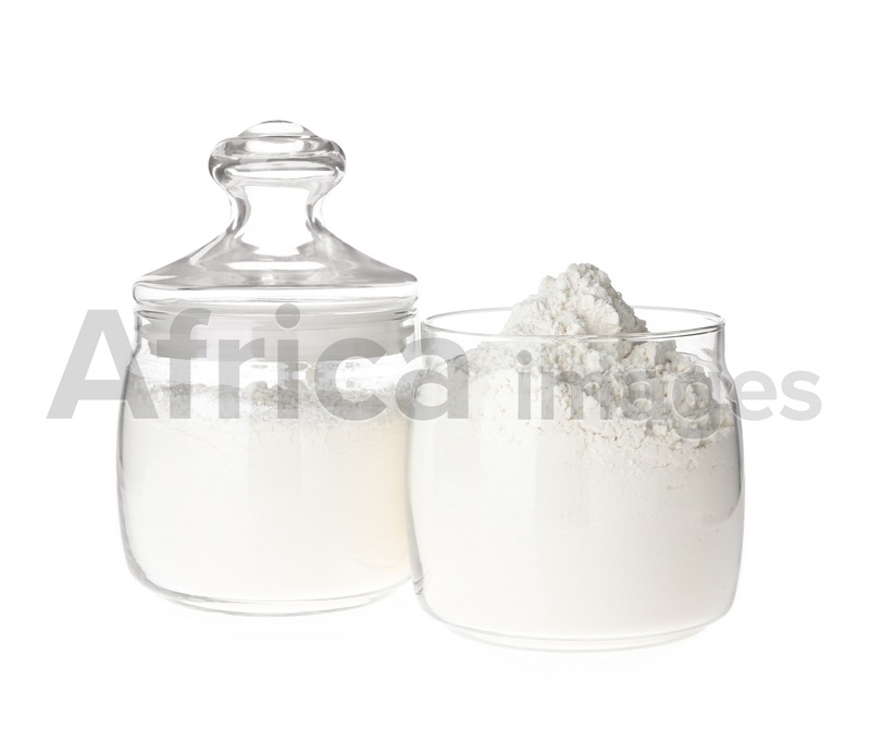 Organic flour in glass jars isolated on white