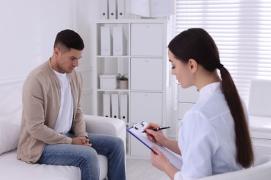 Man having appointment with STD specialist in clinic