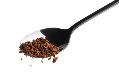 Pouring instant coffee from spoon on white background