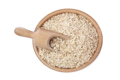 Oatmeal, wooden bowl and scoop on white background, top view