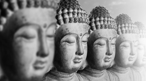 Row of stone Buddha sculptures, banner design. World religion